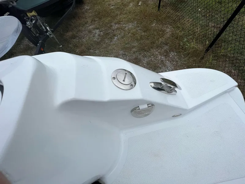 Slide: The Image of 2023 Wellcraft 262 Fisherman boat deck with cleat and fuel cap. - 46