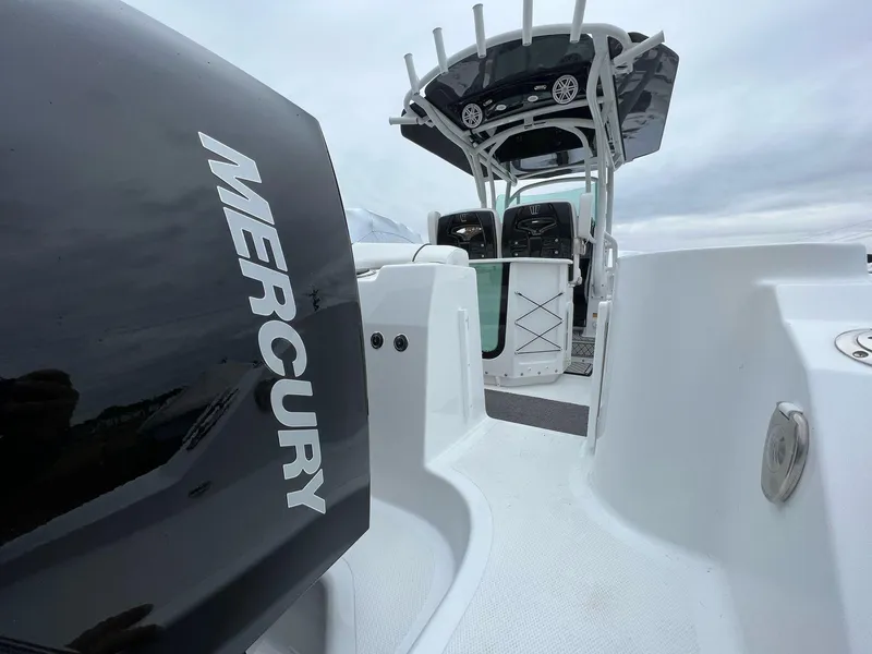 Slide: The Image of 2023 Wellcraft 262 Fisherman boat with Mercury engine, featuring sleek design and modern amenities. - 8