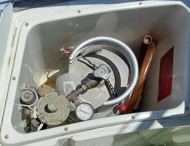Slide: The Image of Boat gas compartment with gauges and hoses, C&C 38 MKIII, 1987 model. - 16