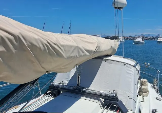 Slide: The Image of Sailboat C&C 38 MKIII, 1987 model, docked in a sunny marina. - 17