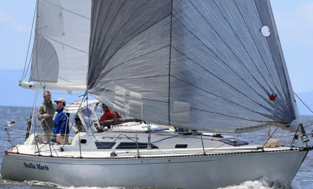 Slide: The Image of Sailing yacht C&C 38 MKIII 1987 on open water with crew. - 30