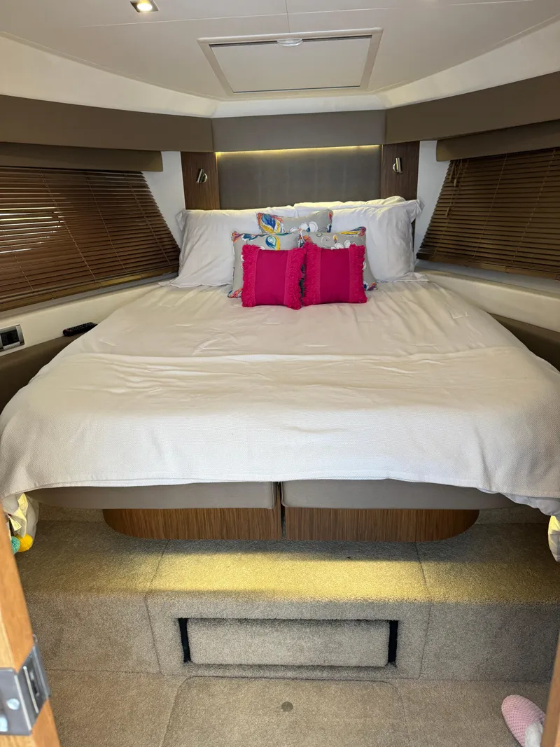Slide: The Image of Luxurious 2017 Sea Ray Sundancer 460 cabin with cozy bed and elegant decor. - 13