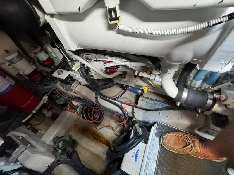 Slide: The Image of Engine room of 2017 Sea Ray Sundancer 460, showing mechanical components and wiring. - 3