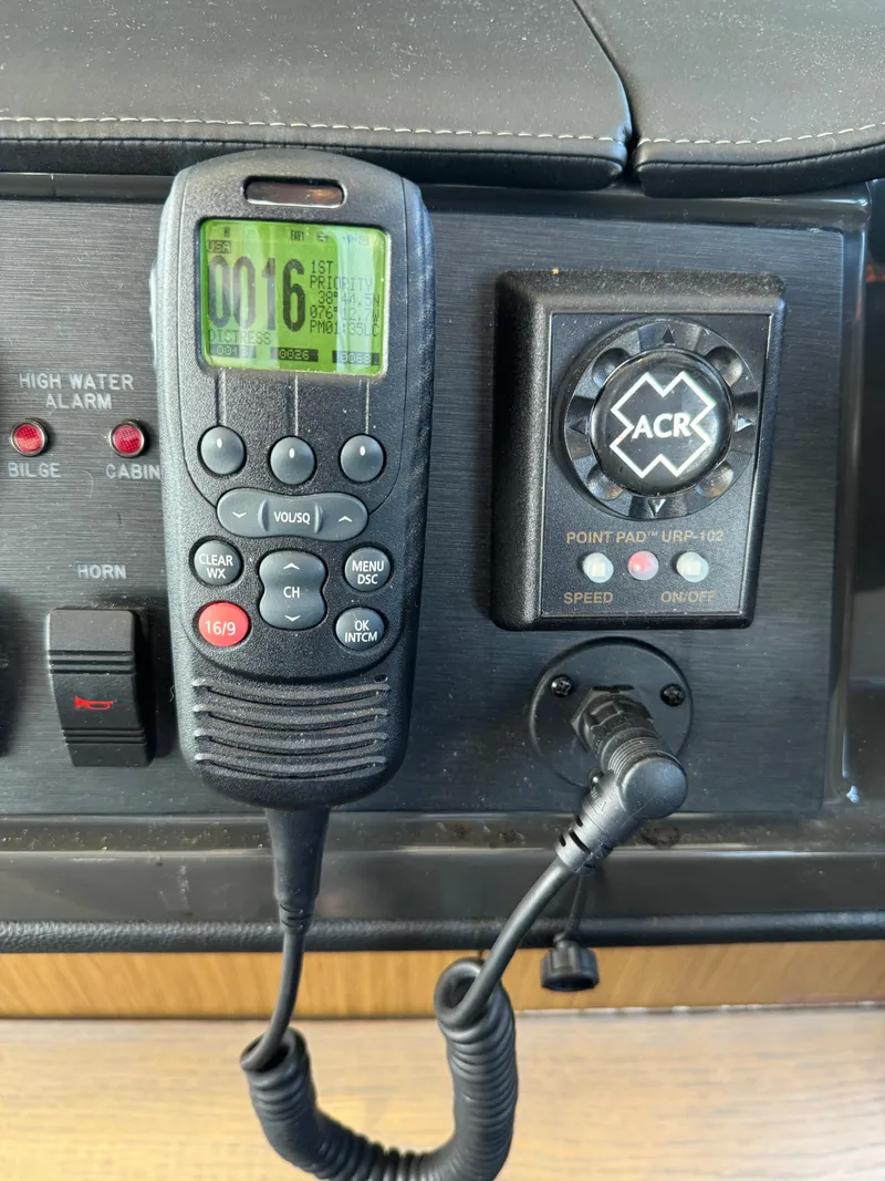 Slide: The Image of Control panel of a 2017 Sea Ray Sundancer 460 with radio and ACR device. - 37