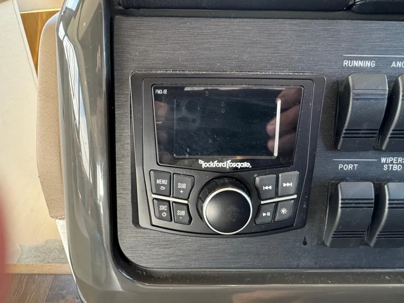 Slide: The Image of Control panel of a 2017 Sea Ray Sundancer 460 with Rockford Fosgate audio system. - 38