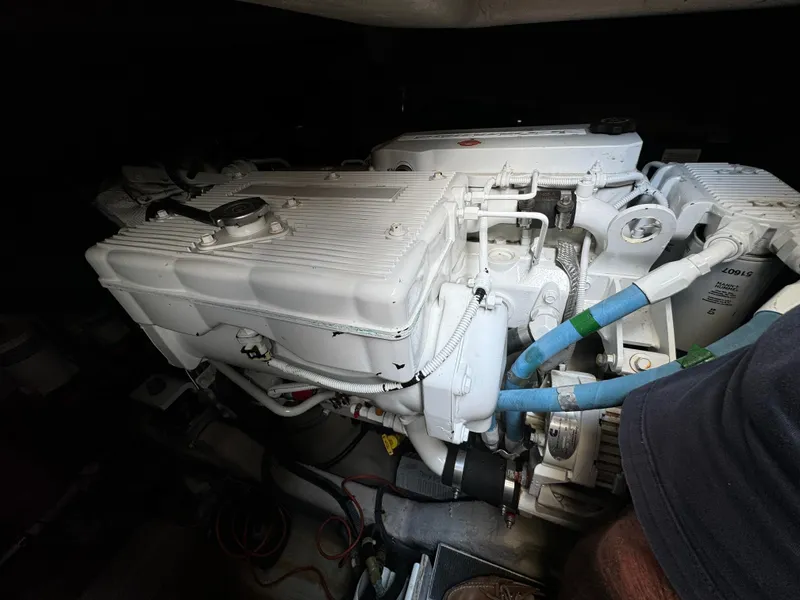 Slide: The Image of Engine compartment of a 2017 Sea Ray Sundancer 460 yacht, showcasing mechanical components. - 4