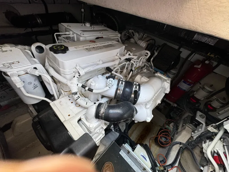 Slide: The Image of Engine room of 2017 Sea Ray Sundancer 460 yacht, showcasing mechanical components. - 5