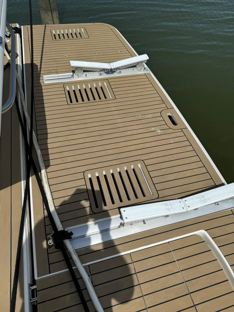 Slide: The Image of 2017 Sea Ray Sundancer 460 swim platform with teak decking and water access. - 6