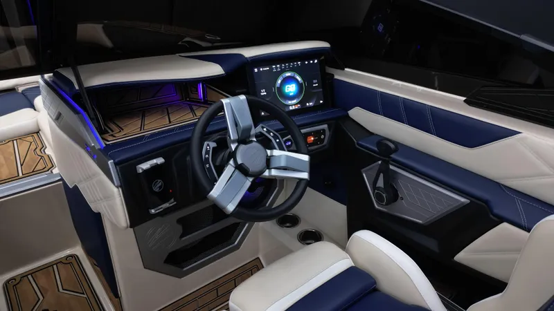 Slide: The Image of 2024 Tigé Ultré 23ZX boat interior with modern dashboard and steering wheel. - 11
