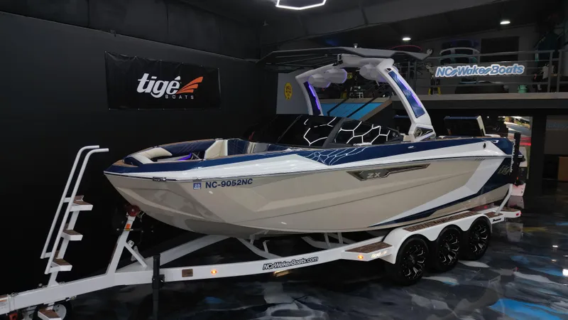 Slide: The Image of 2024 Tigé Ultré 23ZX boat on display in showroom. - 4