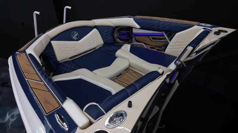 Slide: The Image of Luxurious interior of 2024 Tigé Ultré 23ZX boat with plush seating and modern design. - 6