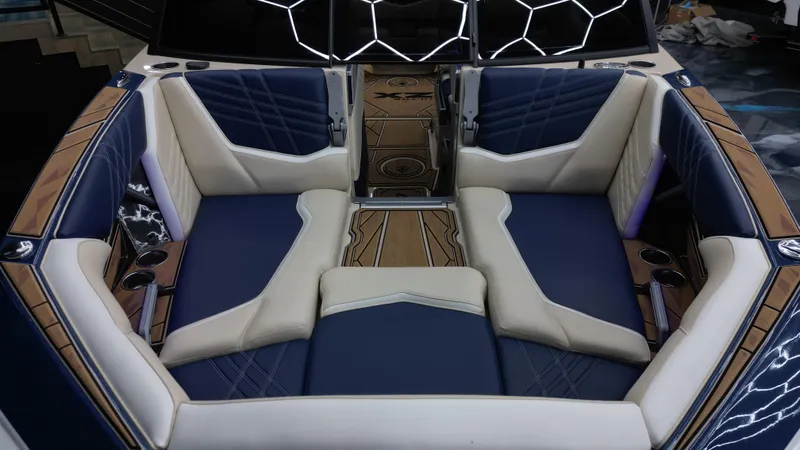 Slide: The Image of Luxurious interior of 2024 Tigé Ultré 23ZX boat with stylish seating and modern design. - 7