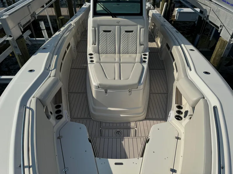 Slide: The Image of 2024 Sailfish 360 CC boat interior with spacious seating and modern design. - 18