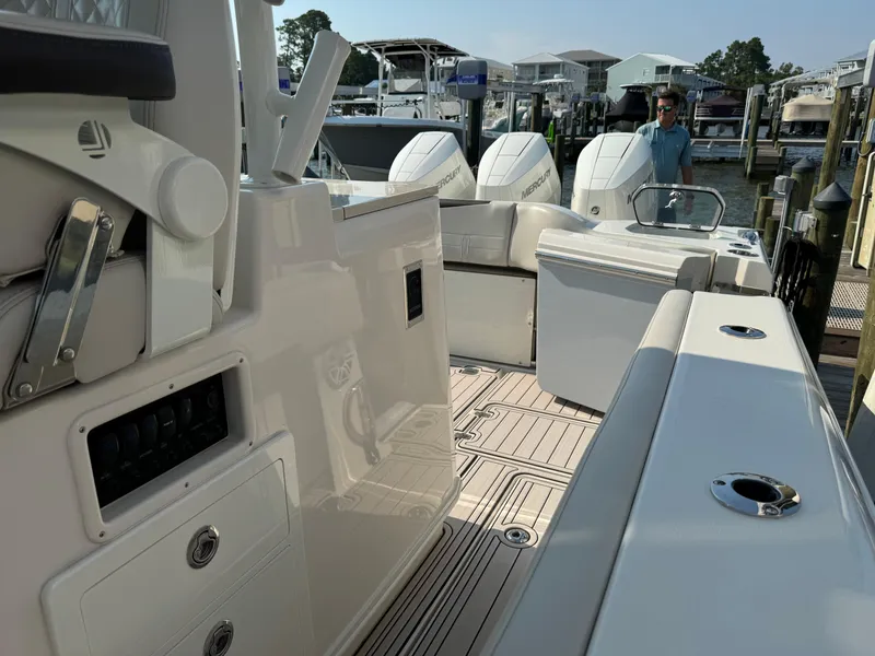 Slide: The Image of 2024 Sailfish 360 CC boat interior with modern design and powerful engines. - 31
