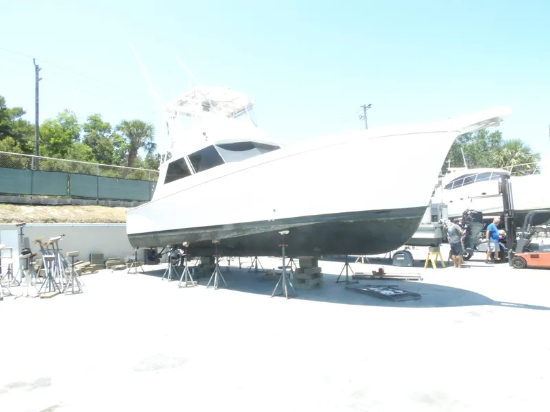 Slide: The Image of 1967 Hatteras Convertible yacht on dry dock for maintenance. - 11