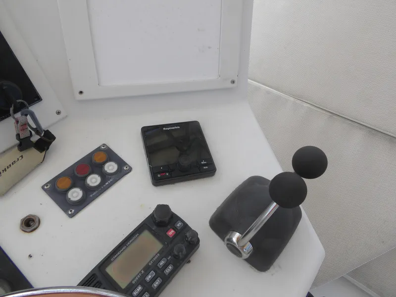 Slide: The Image of Control panel of a 1967 Hatteras Convertible boat with navigation equipment. - 40