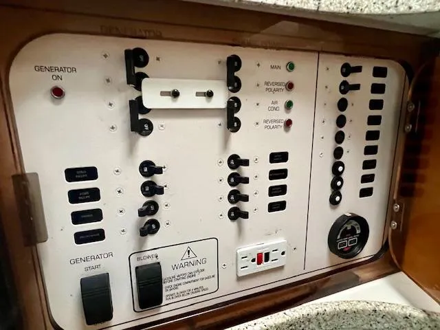 Slide: The Image of Electrical control panel on a 2000 Rinker Fiesta Vee 342 boat. - 17
