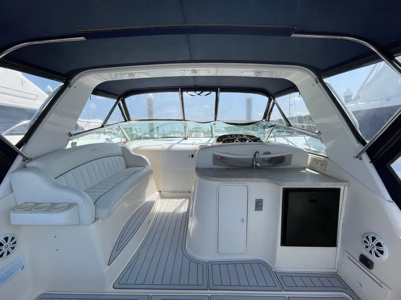 Slide: The Image of Interior of 2000 Rinker Fiesta Vee 342 boat with seating and helm. - 3