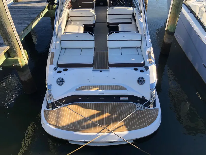 Slide: The Image of 2017 Regal 2800 boat with spacious white seating and sleek design. - 43