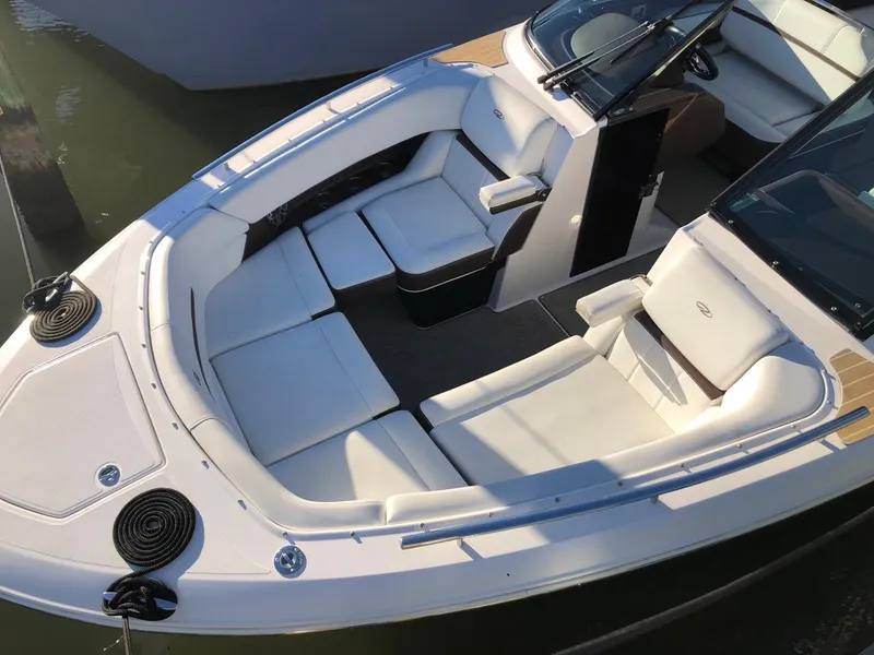 Slide: The Image of 2017 Regal 2800 boat with sleek design, docked at marina. - 44