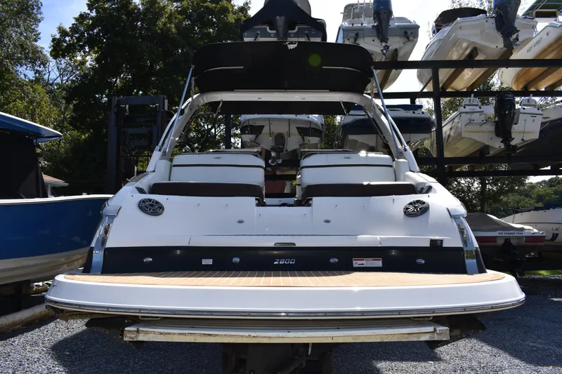 Slide: The Image of 2017 Regal 2800 Bowrider interior with white seating and sleek design. - 47