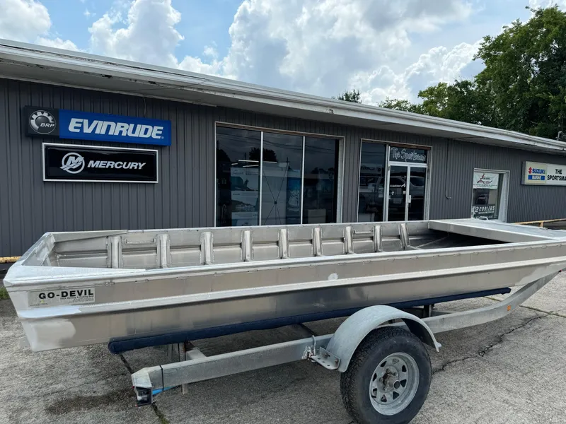 Slide: The Image of 2024 Go-Devil 16 x 60 Crawfish boat on trailer outside dealership. - 4