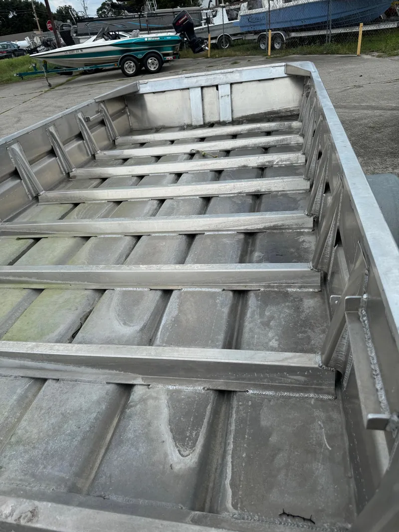 Slide: The Image of 2024 Go-Devil 16 x 60 Crawfish boat interior, showcasing aluminum construction and spacious design. - 8