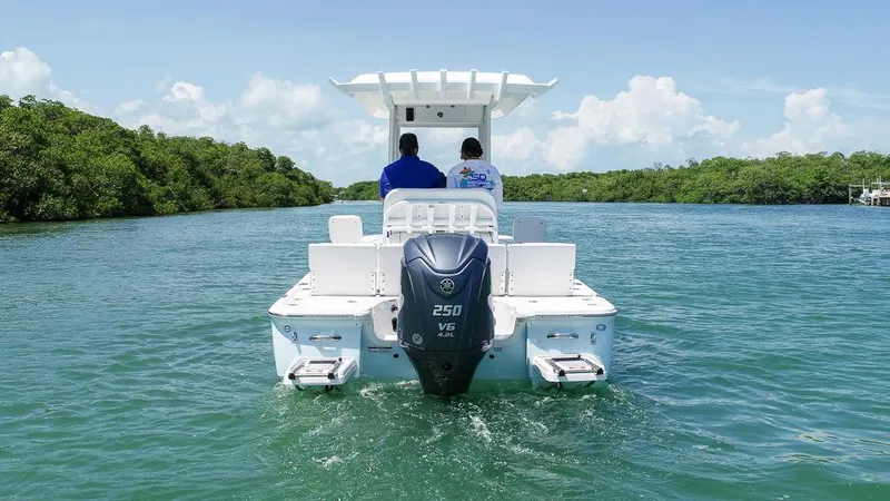 The Image of 2025 Sea Fox 231 Bay Fox boat cruising on clear water. - 0