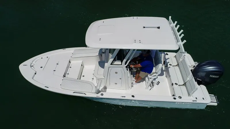 Slide: The Image of 2025 Sea Fox 231 Bay Fox boat on water, aerial view. - 11