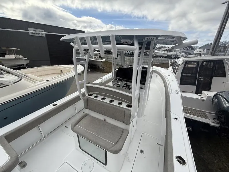 Slide: The Image of 2025 Sea Hunt Gamefish 28 Coffin Box boat, featuring a sleek console and seating area. - 6