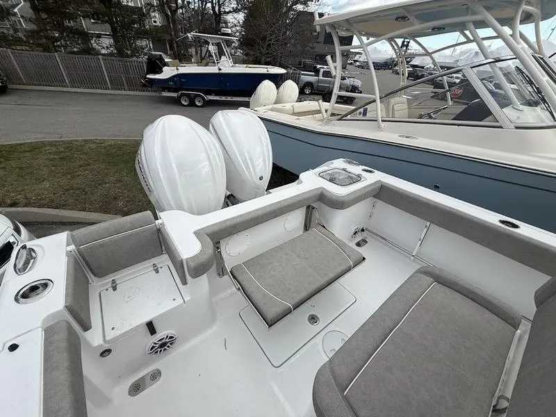 Slide: The Image of 2025 Sea Hunt Gamefish 28 Coffin Box boat with dual engines and spacious seating. - 8