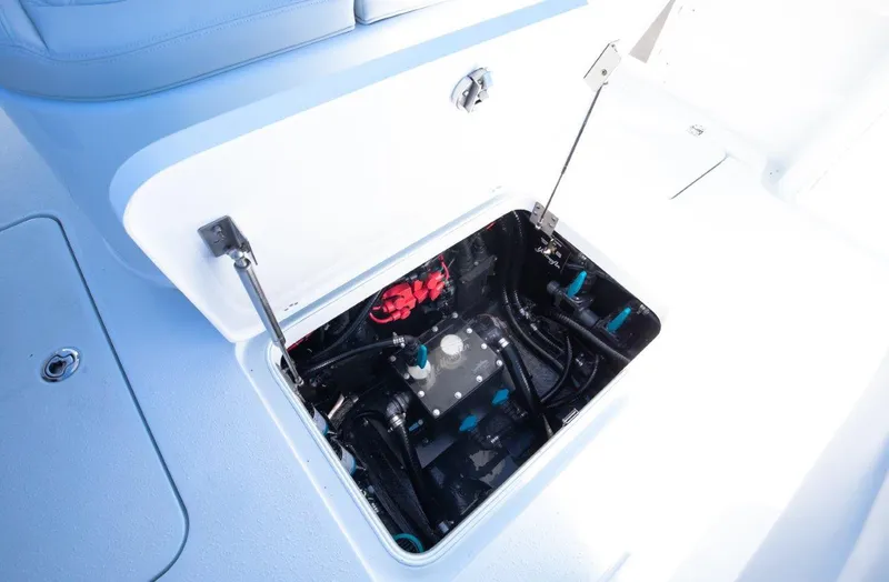 Slide: The Image of 2025 Yellowfin 32 Offshore boat storage compartment with hydraulic system. - 17