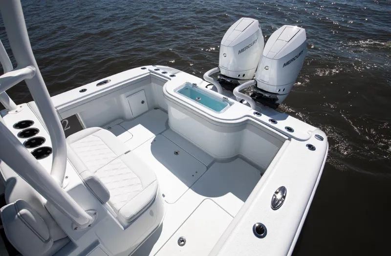 Slide: The Image of 2025 Yellowfin 32 Offshore boat with dual Mercury engines on water. - 8