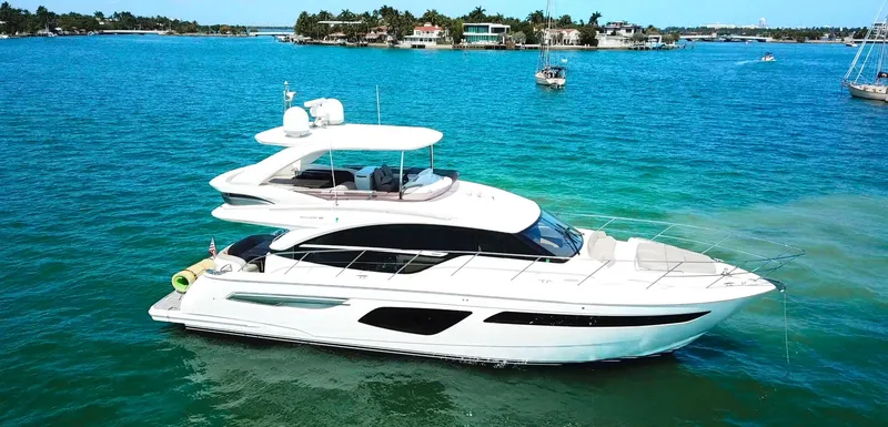 The Image of Luxurious 2018 Princess F55 yacht cruising on clear blue waters. - 0