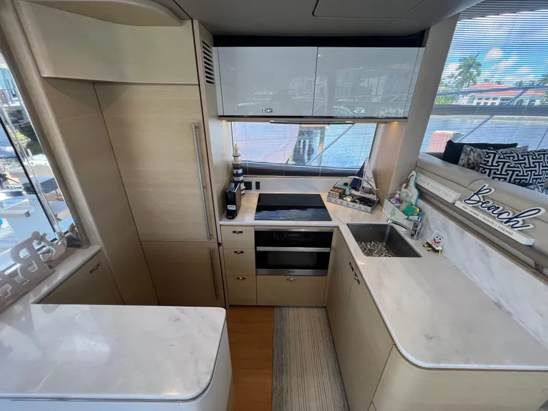 Slide: The Image of Modern kitchen interior of 2018 Princess F55 yacht with sleek cabinetry and appliances. - 10
