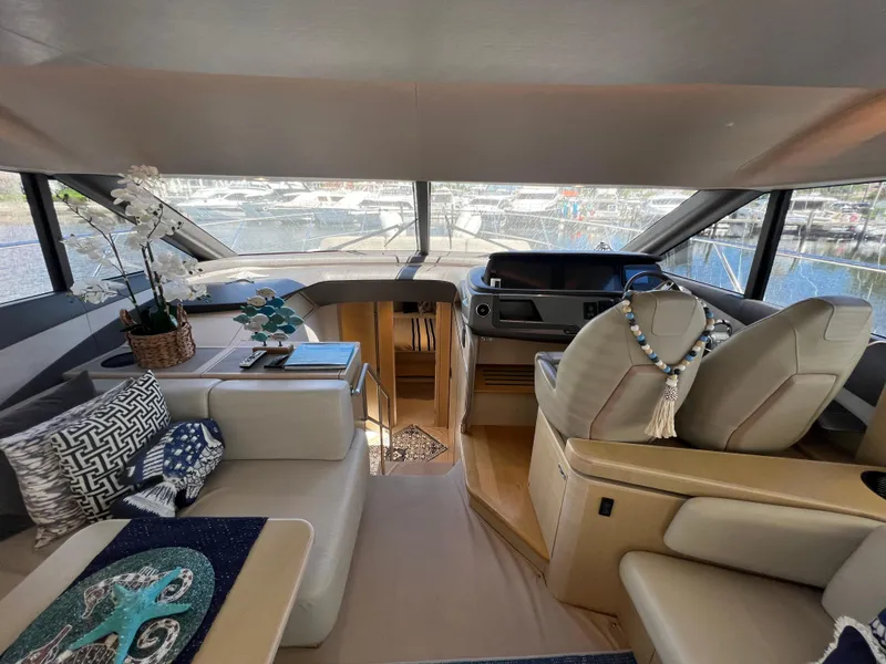 Slide: The Image of Luxurious interior of 2018 Princess F55 yacht with elegant seating and decor. - 14