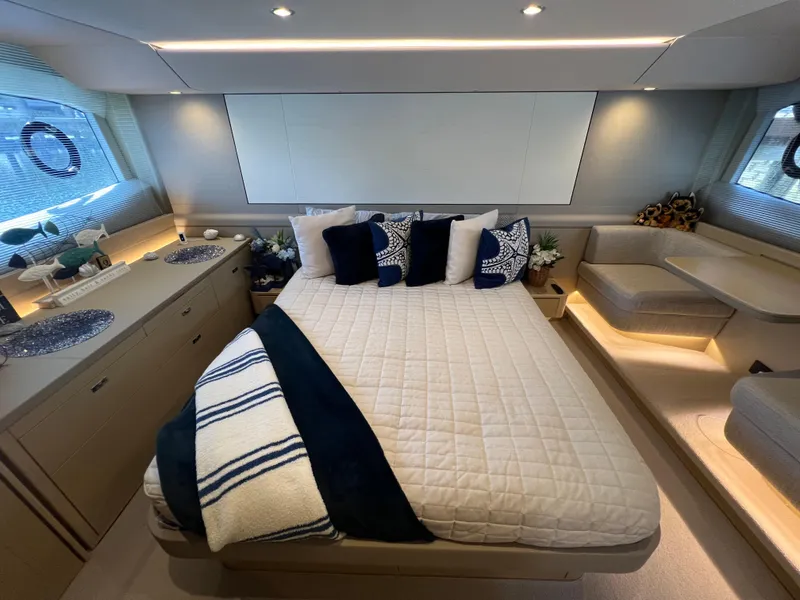 Slide: The Image of Luxurious bedroom interior of 2018 Princess F55 yacht with elegant decor and cozy bedding. - 20