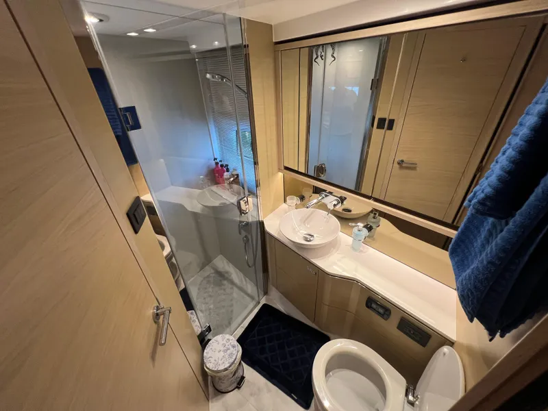Slide: The Image of Luxurious bathroom in 2018 Princess F55 yacht with modern fixtures and elegant design. - 24