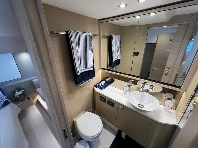 Slide: The Image of Luxurious bathroom in 2018 Princess F55 yacht with modern fixtures and elegant design. - 27