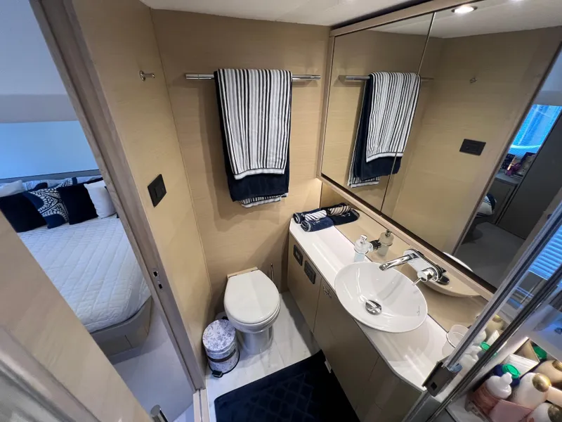 Slide: The Image of Luxurious bathroom in 2018 Princess F55 yacht with modern fixtures and elegant design. - 28