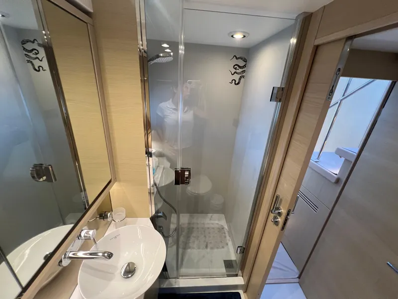 Slide: The Image of Modern bathroom in 2018 Princess F55 yacht with glass shower and sleek fixtures. - 29