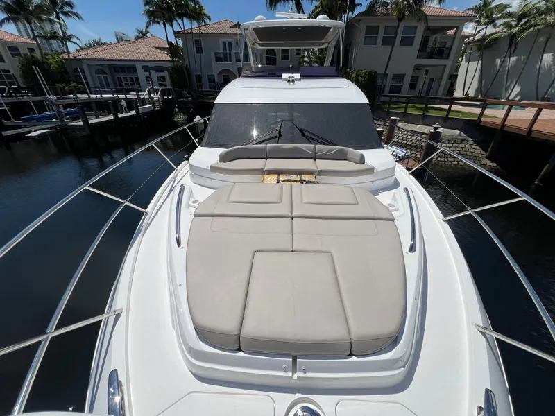 Slide: The Image of 2018 Princess F55 yacht with sunbathing deck, docked in a marina. - 33