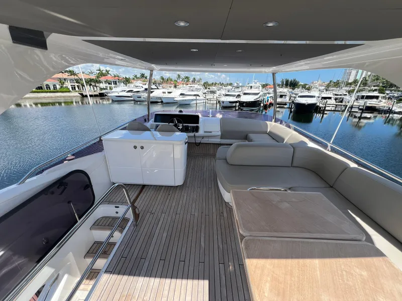 Slide: The Image of Luxurious 2018 Princess F55 yacht with spacious deck and marina view. - 36