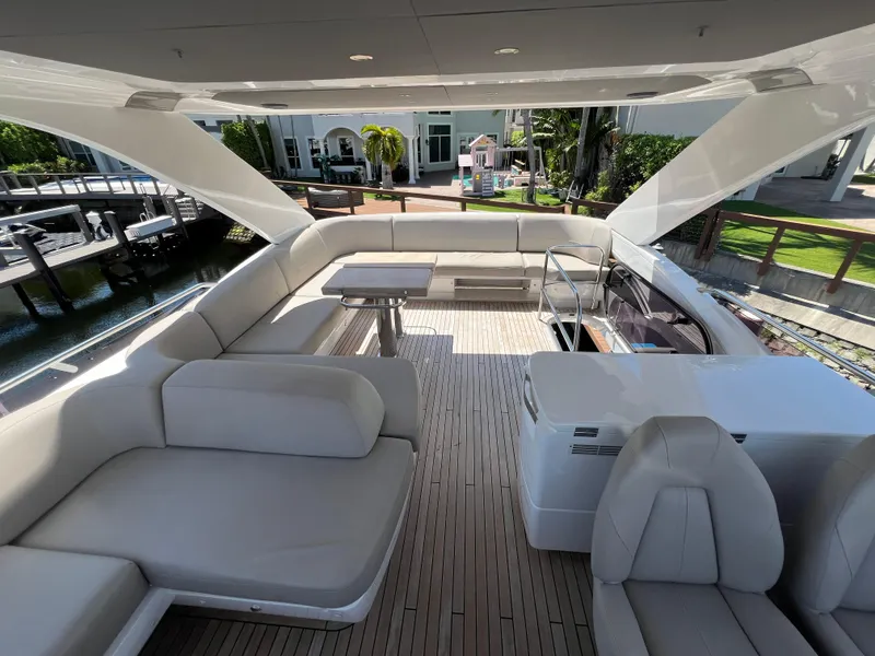 Slide: The Image of Luxurious 2018 Princess F55 yacht with spacious deck and elegant seating area. - 39