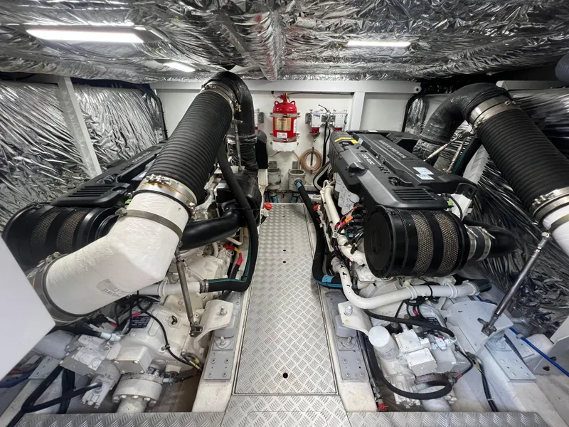 Slide: The Image of Engine room of 2018 Princess F55 yacht with dual engines and metallic insulation. - 42