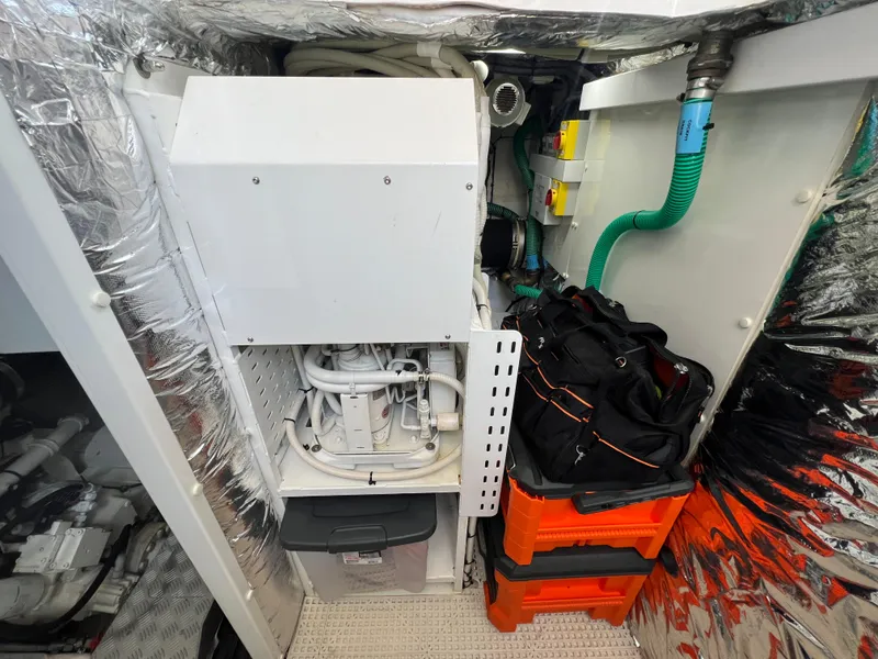 Slide: The Image of Engine room of 2018 Princess F55 yacht with equipment and storage. - 45