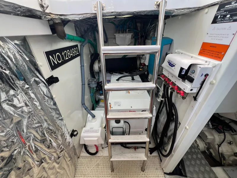 Slide: The Image of Engine room of 2018 Princess F55 yacht with ladder and equipment. - 46