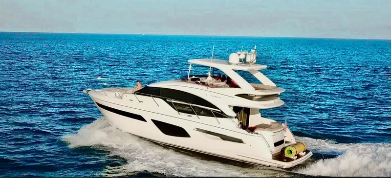 Slide: The Image of Luxury 2018 Princess F55 yacht cruising on open blue sea. - 7