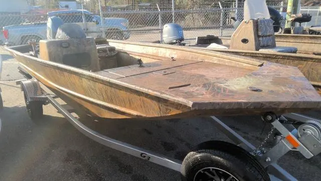 Slide: The Image of 2024 G3 17 SC boat on trailer, parked outdoors. - 1