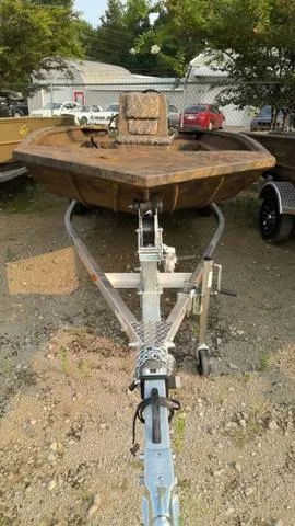 Slide: The Image of 2025 G3 17 CC boat on trailer in outdoor setting. - 3